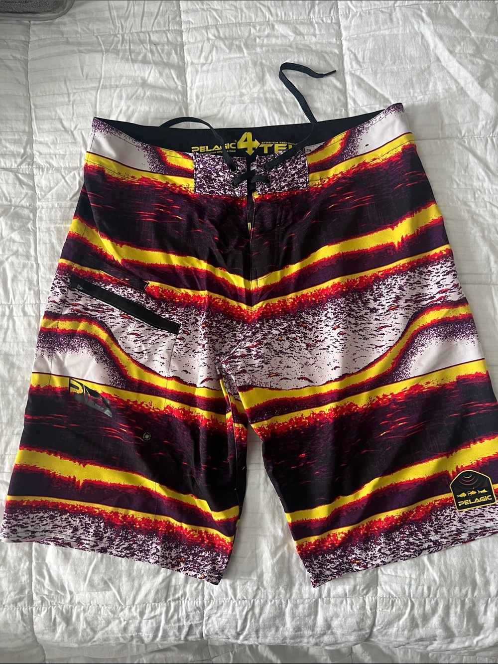 Pelagic Men’s Yellow, purple, Red & Black Striped Board Shorts